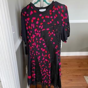 Koche dress fits like a small beautiful and perfect condition